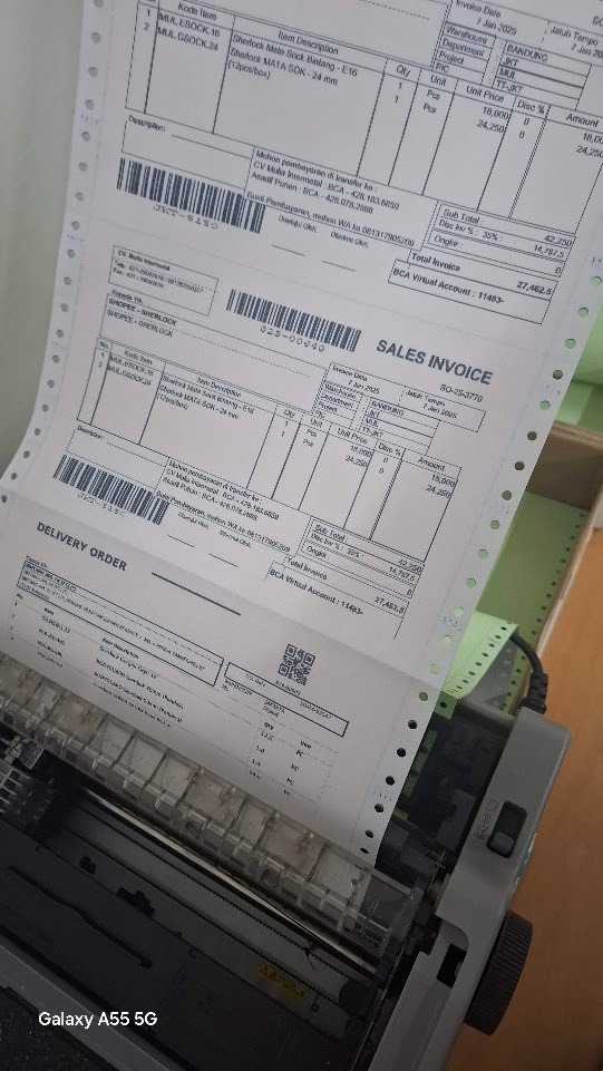 Sales invoice dan delivery order SherlockTools tercetak di printer dot matrix